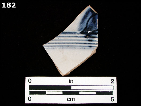 STONEWARE, WHITE SALT GLAZED, DEBASED SCRATCH BLUE specimen 182 