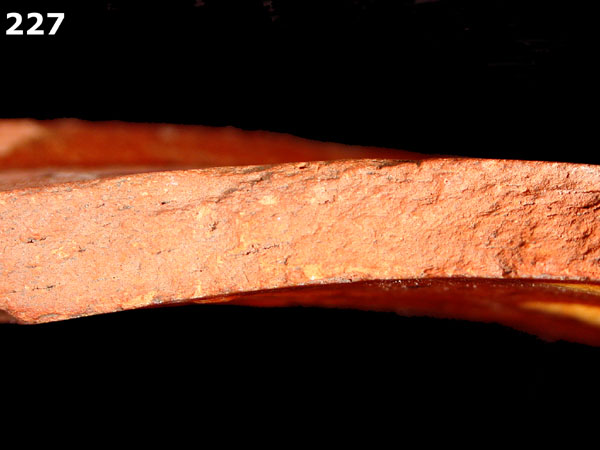 SLIPWARE, SLIP-TRAILED REDWARE specimen 227 side view
