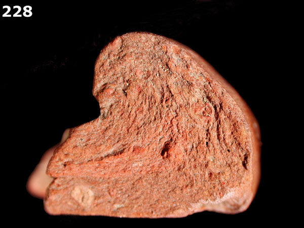 SLIPWARE, SLIP-TRAILED REDWARE specimen 228 side view