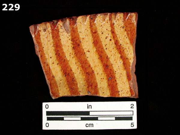 SLIPWARE, SLIP-TRAILED REDWARE specimen 229 front view