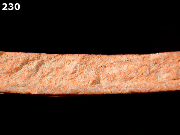 SLIPWARE, SLIP-TRAILED REDWARE specimen 230 side view