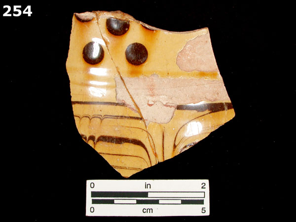 SLIPWARE, STAFFORDSHIRE-TYPE, ENGLISH specimen 254 