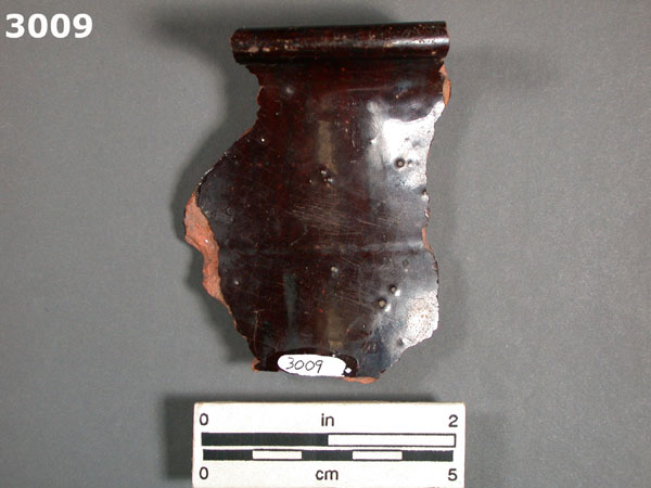 BLACK LEAD GLAZED COARSE EARTHENWARE specimen 3009 rear view