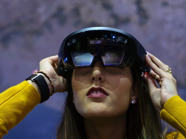 woman using virtual reality glasses