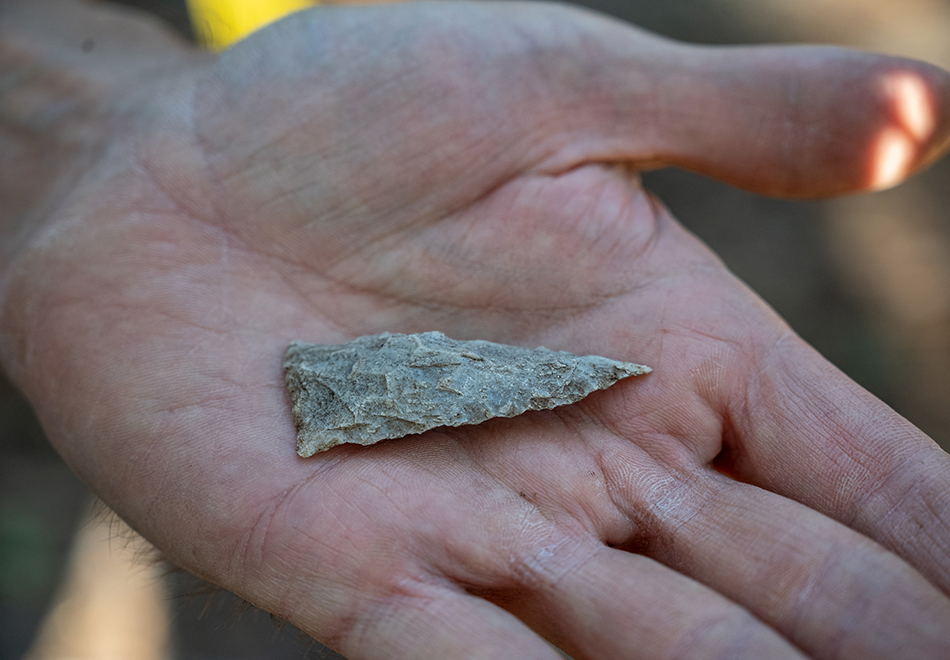 person holding rock