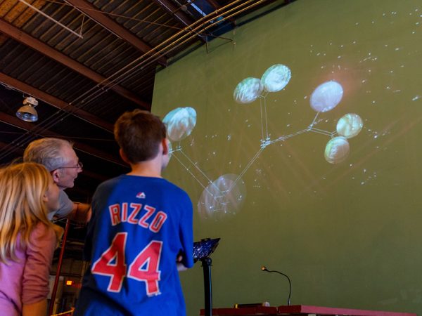 people looking at projection