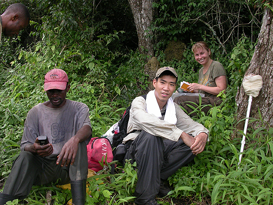 scientists resting on a trek in the Congo