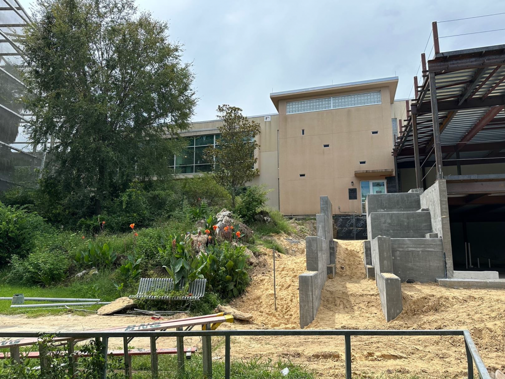 Construction of the foundation and walls for new stairs and entrance platform to McGuire Center