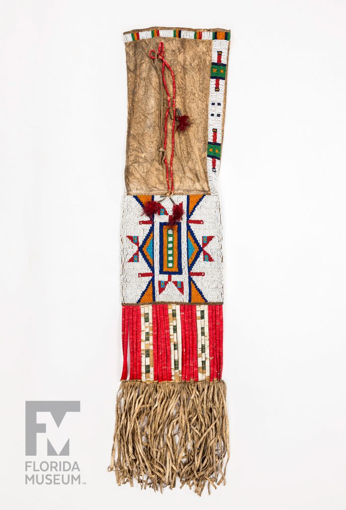 pouch with colorful quillwork in many colors and long leather and bead fringe