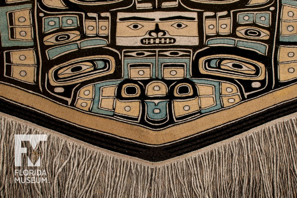 Close up of face motifs on the Chilkat Blanket