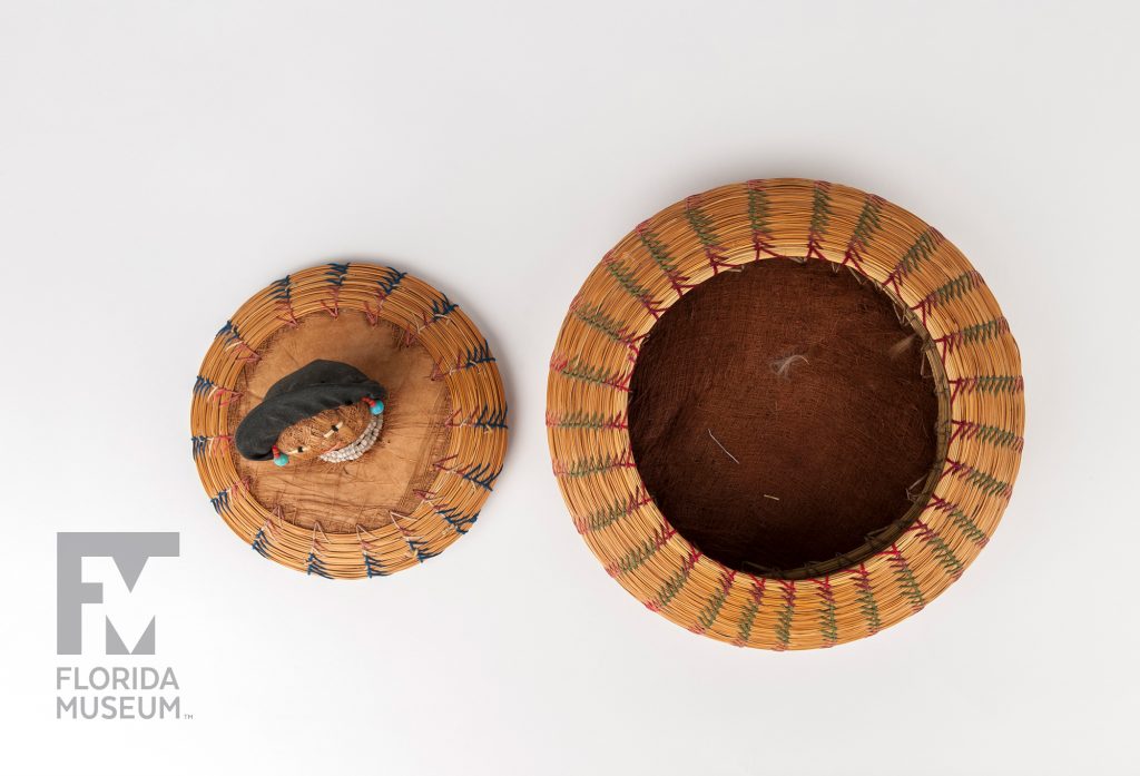 photographed from above, sweetgrass basket with the lid placed next to it