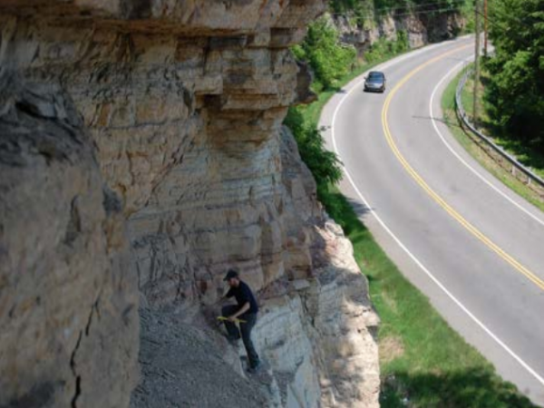 Fieldwork in the middle Silurian carbonates of central Tennessee. Climbing the heights while taking stratigraphic
measurements was a secondary hazard to the profundity
of ticks at this locality!