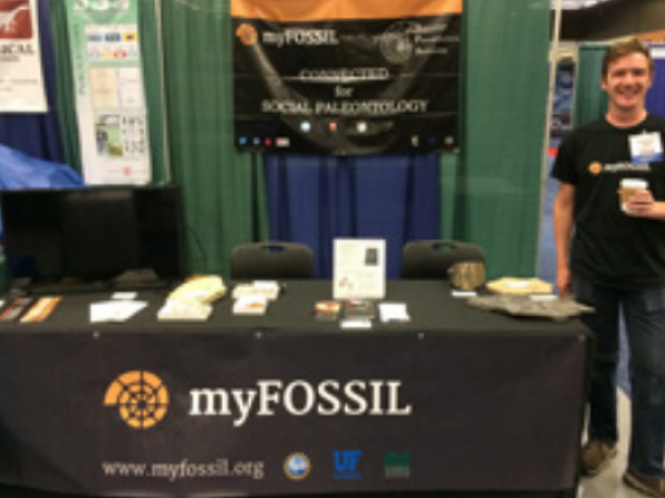 MacKenzie Smith at the FOSSIL booth at GSA