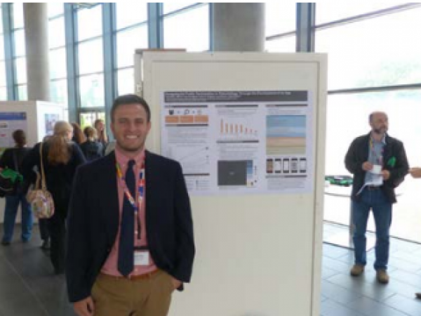 Richard Bex and his award winning poster