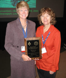 Ann Molineux and Linda receiving the Grover E. Murray Award for Best Published Paper 