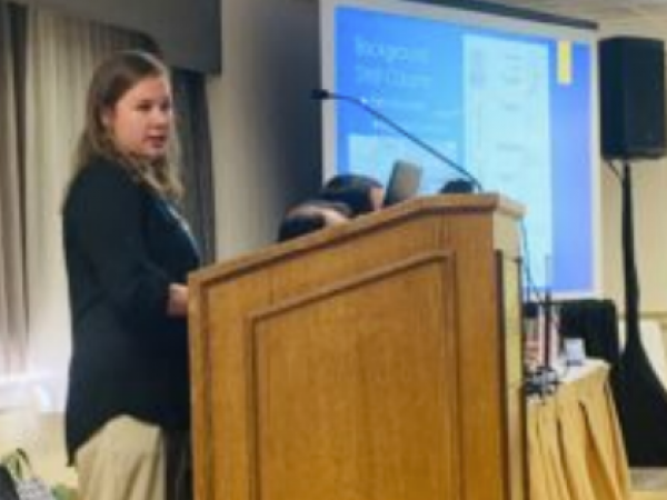 Fauve Wilson presenting on the shark and ray fauna found during the FOSSIL Belgrade 2018 trip.