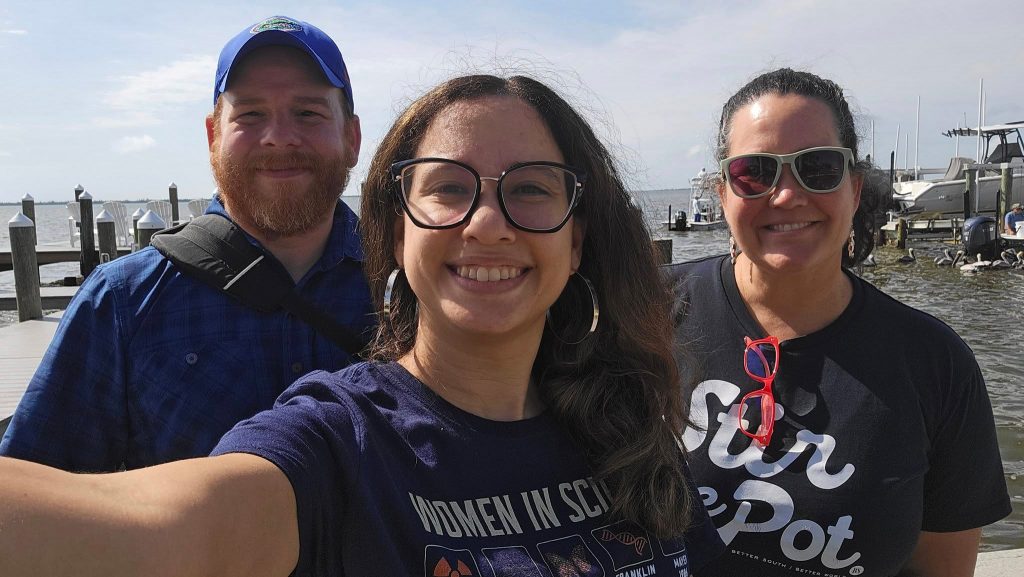 group selfie of the three members of the education team
