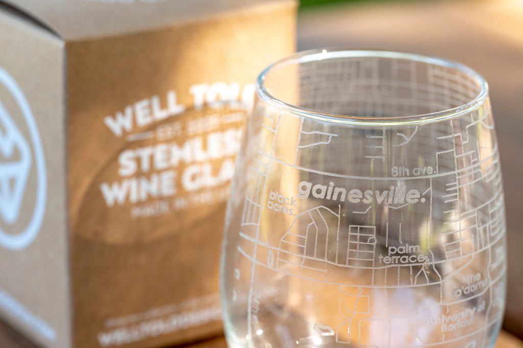 stemless wine glass etched with a map of Gainesville, FL.