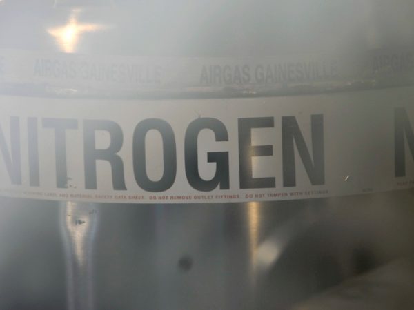 The liquid nitrogen used to replenish the freezer is stored in a Dewar flask, designed to provide excellent thermal insulation. (c) Photo by Jeff Gage.
