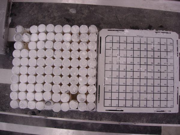 Each box holds 100 tissue sample vials. (c) Photo by Jeff Gage.