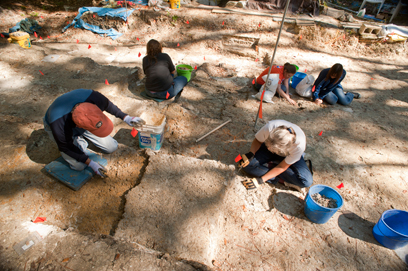 volunteers clearing sediment