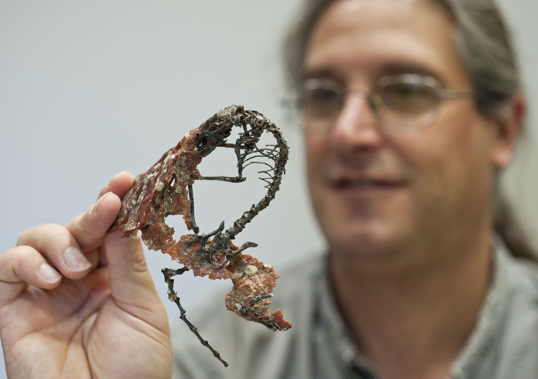 Jonathan Bloch holding skeleton