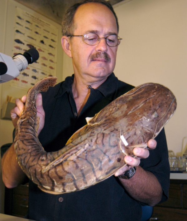 Larry Page holding catfish