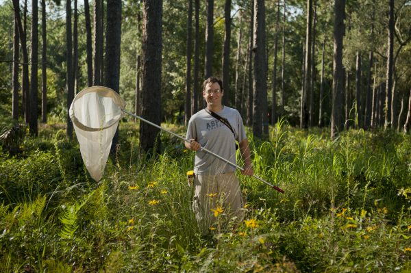 Andy Warren with butterfly net