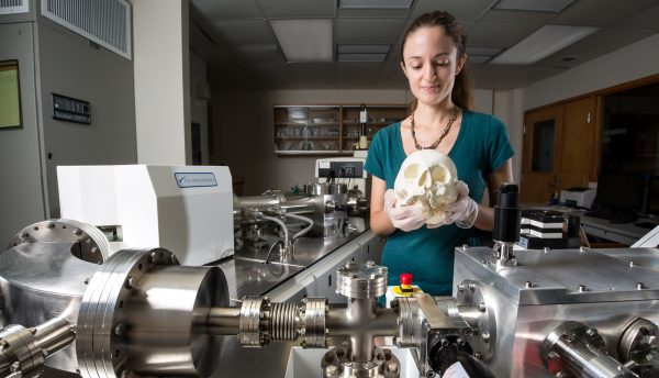 Ashley Sharpe holding skull