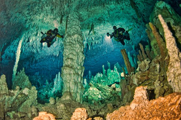 two divers in an underwater cavern