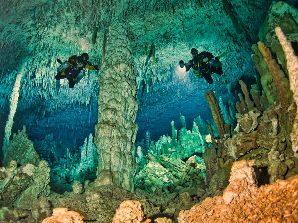 two divers in an underwater cavern
