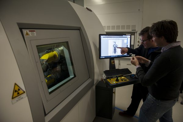 Co-principal investigator Ed Stanley, right, and David Blackburn compare a CT scan of a frog with a 3-D printed replica. Florida Museum of Natural History photo by Kristen Grace