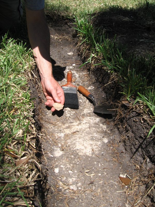 Gifford Waters with a piece of pottery