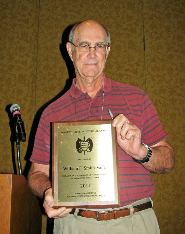 William Smith-Vaniz with award plaque