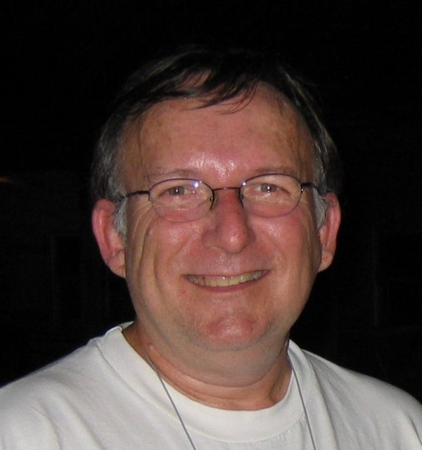 smiling man with glasses