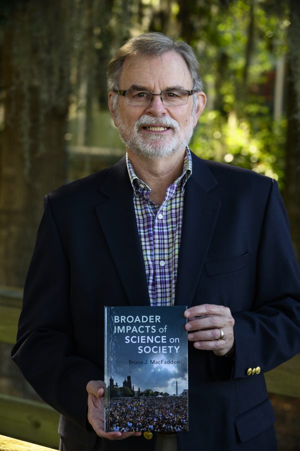 Bruce MacFadden with book