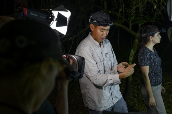 Akito Kawahara holding moth