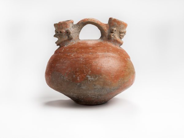 Pottery vessel against a white background