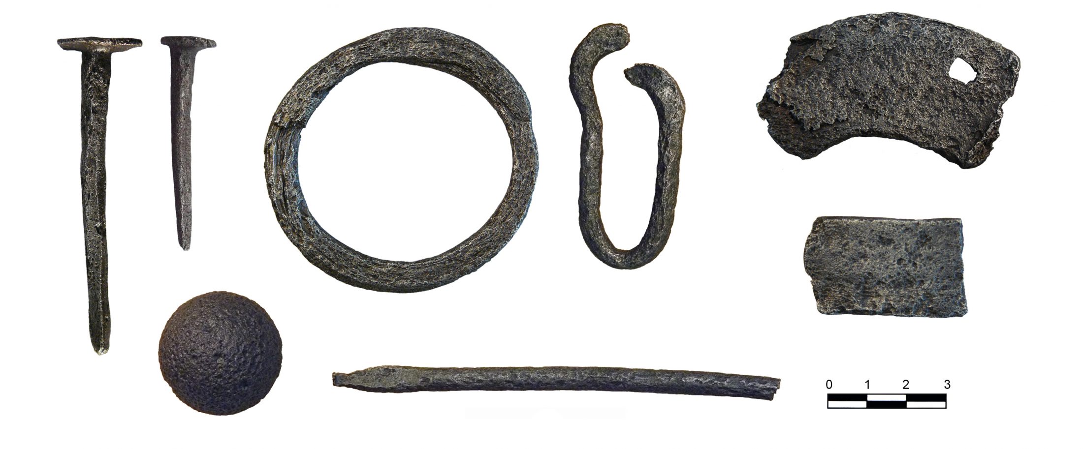 Composite photograph of iron objects arranged on a white background.