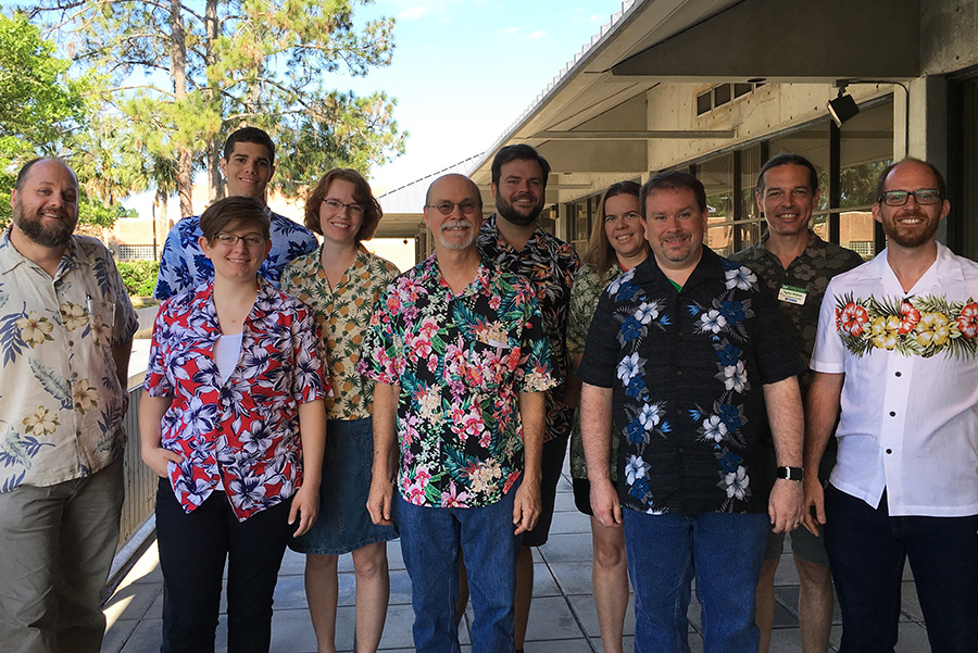 OMT group photo wearing Hawaiian shirts