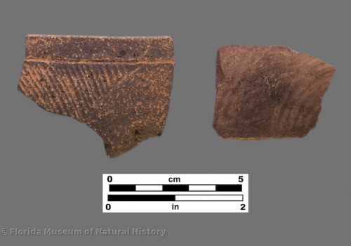 2 sherds with shallow combing or incising