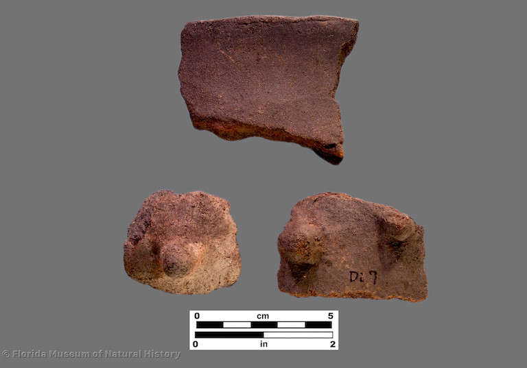 3 sherds of plain pottery, including 2 with podal supports