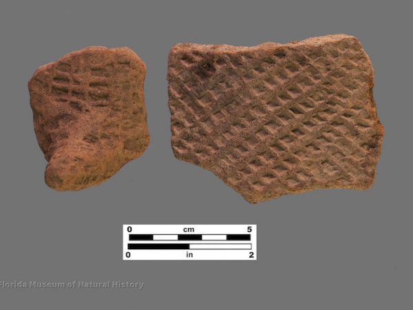 2 sherds with deep check stamping, including 1 podal support