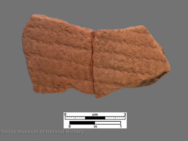 1 sherd with faint cord or fabric impressions