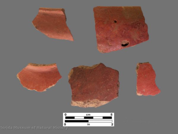 5 sherds with bright red filming