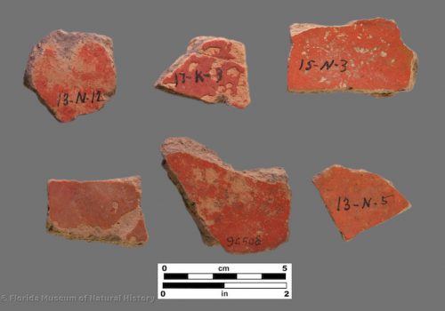 6 sherds of pottery with bright red surfaces
