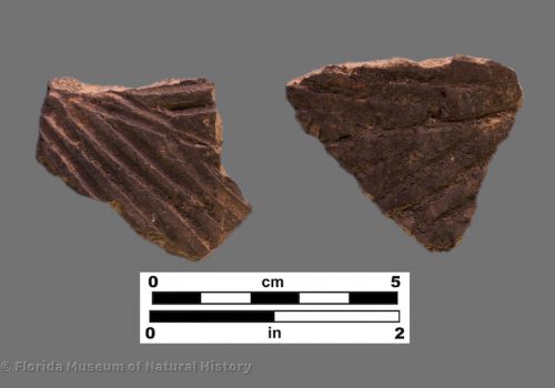 2 sherds with bold parallel line incising