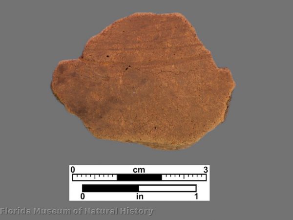1 body sherd with light concentric engraved lines