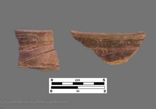 2 sherds with engraving below rim