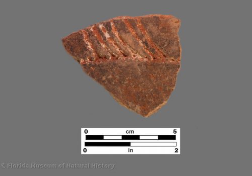 1 sherd with angled linear incisions from rim